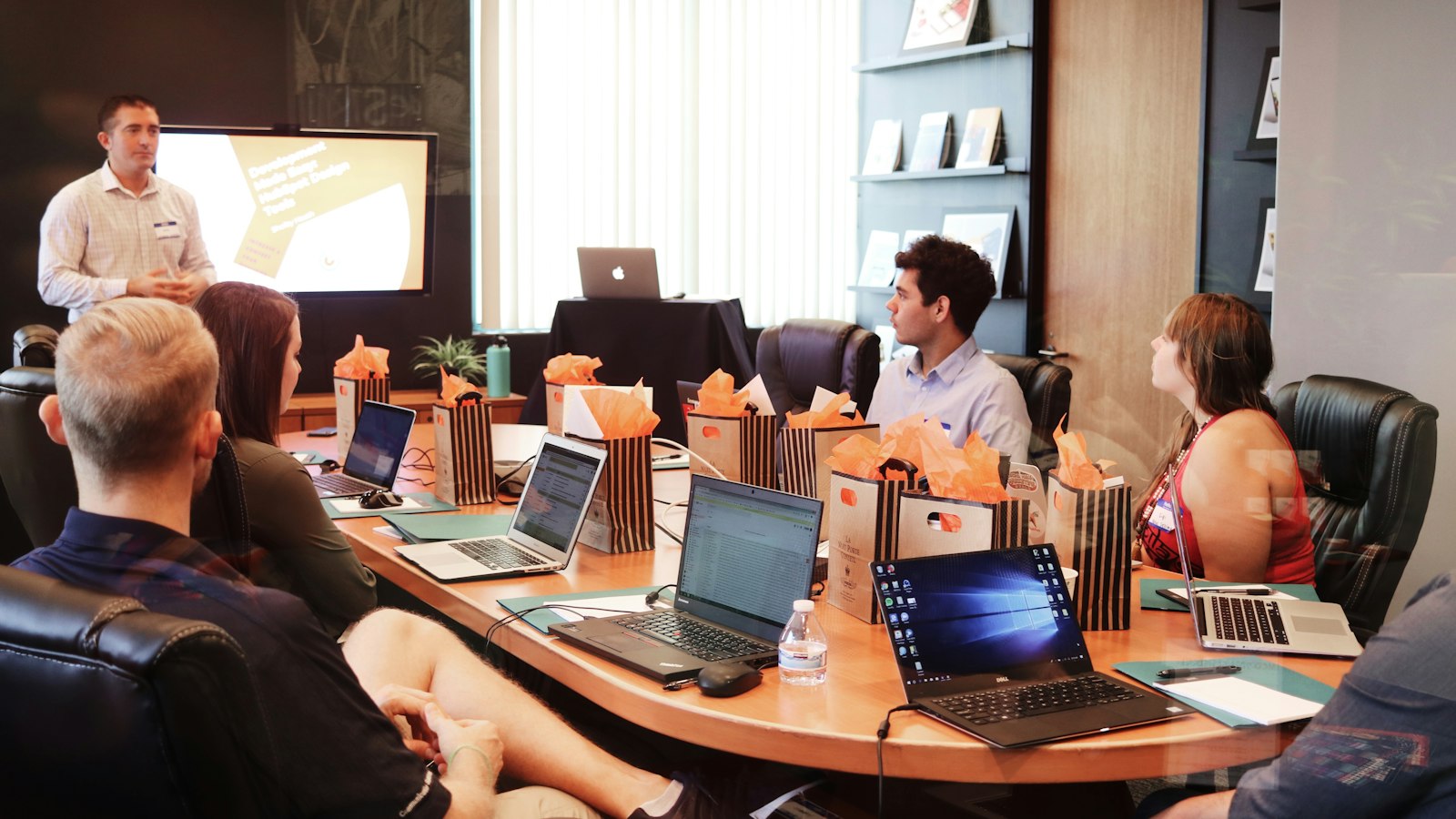 CEO and CTO engaged in serious technology strategy discussion in a conference room